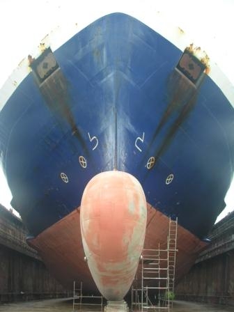 large boat in the shipyard being repaired