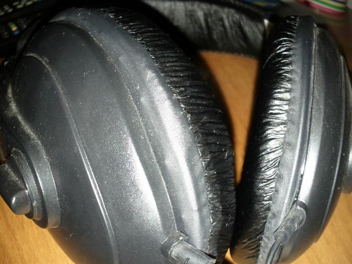 closeup of headphones with the top cord and part closed