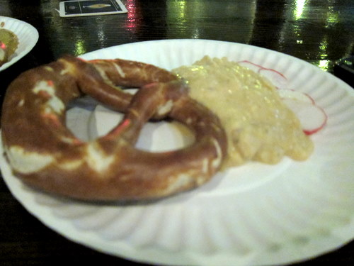 a table with a plate of food and other items