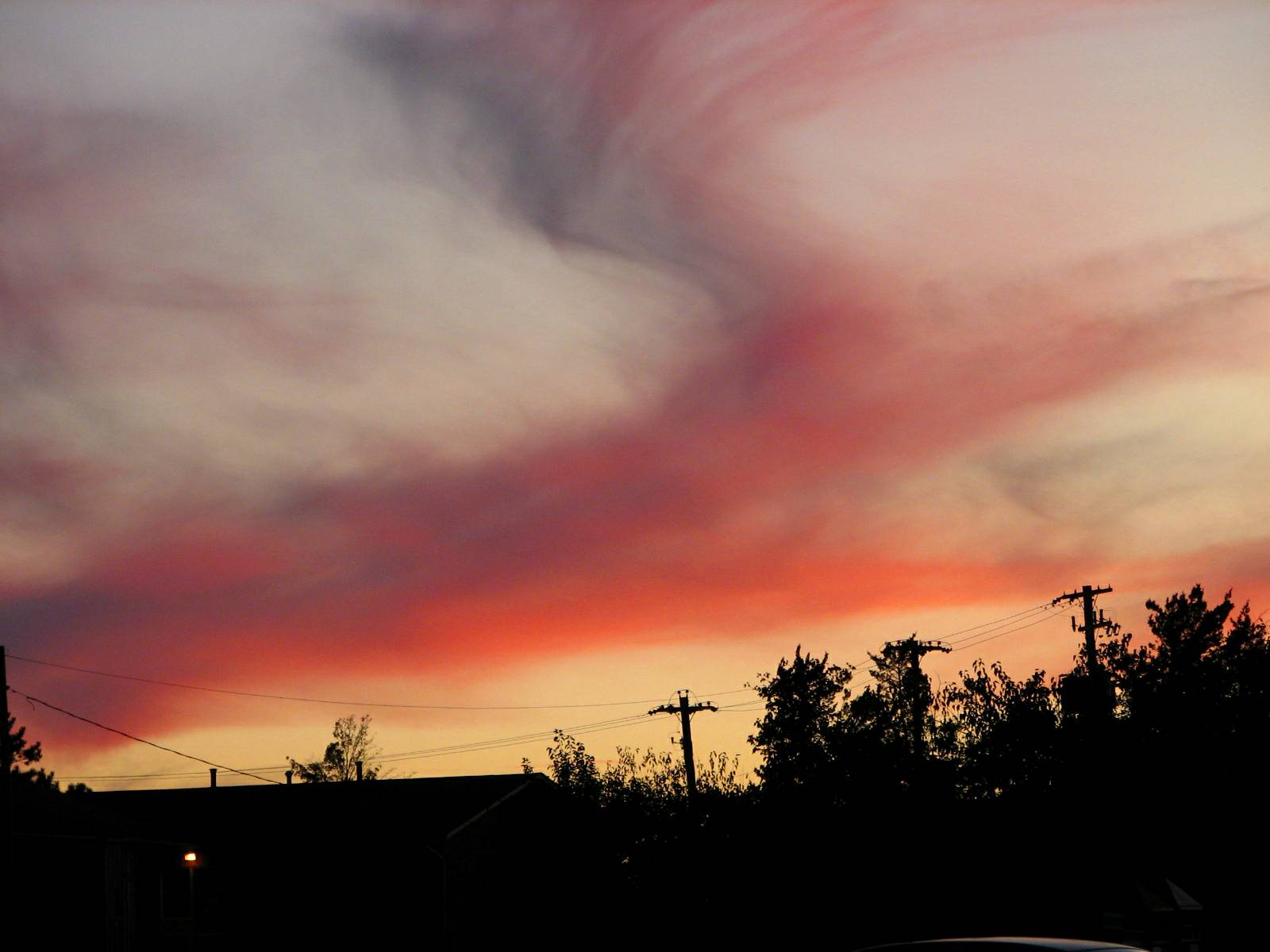 a very colorful sky with some clouds in it