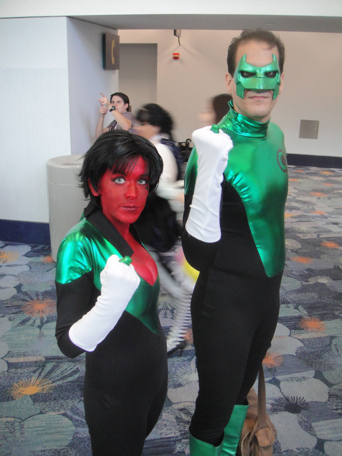 two people dressed as characters posing for a po