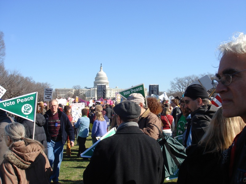 people marching in the middle of a park