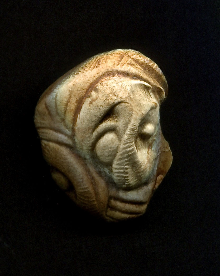 the old carving is carved into a mask