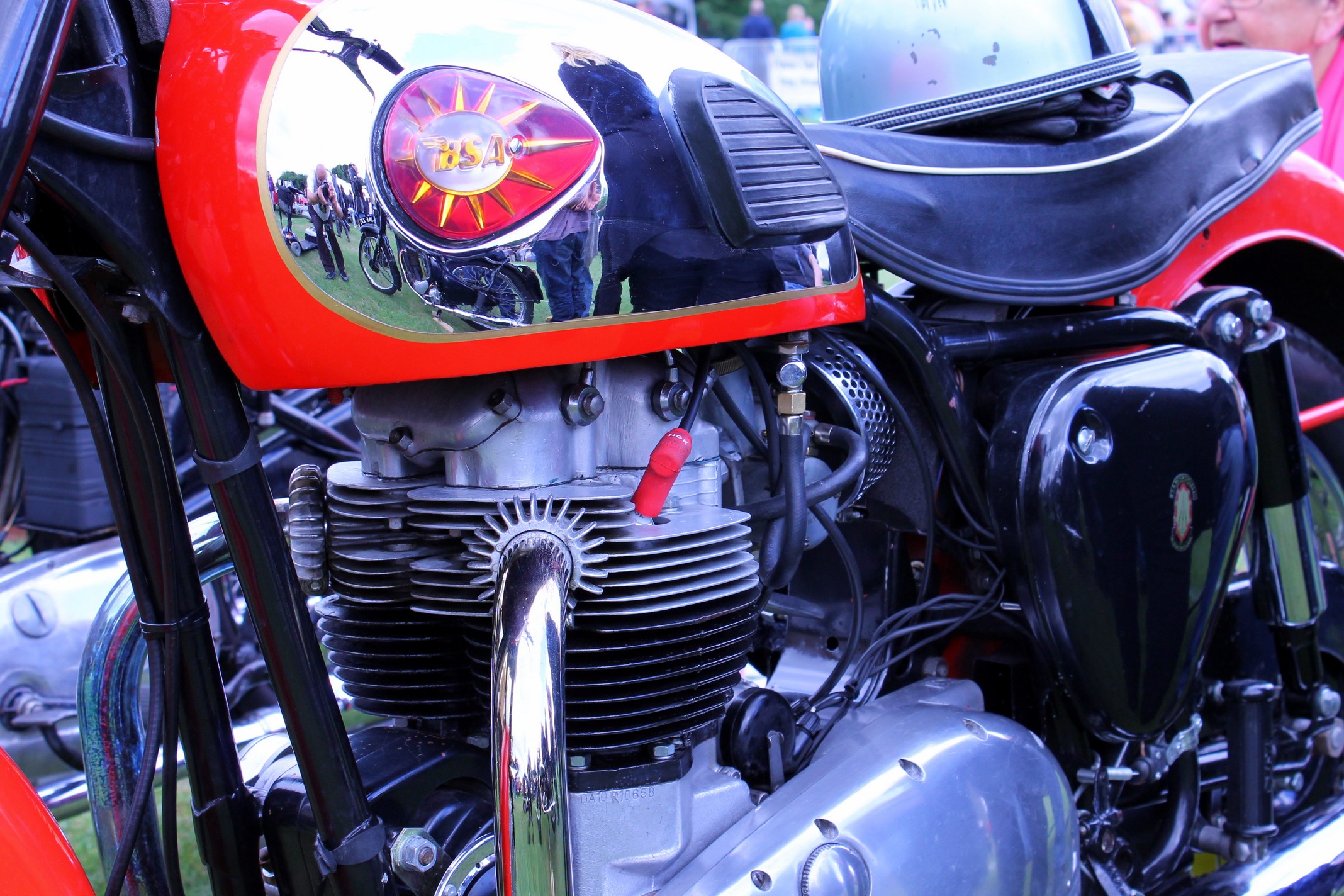 a close up of an old fashioned motorcycle
