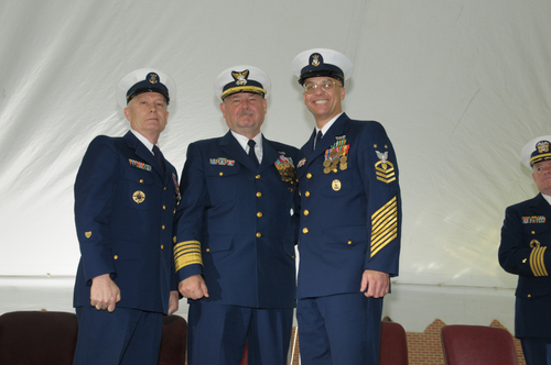 three men in blue and white uniforms posing for a po