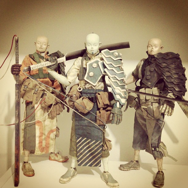 four mannequins that are wearing medieval outfits