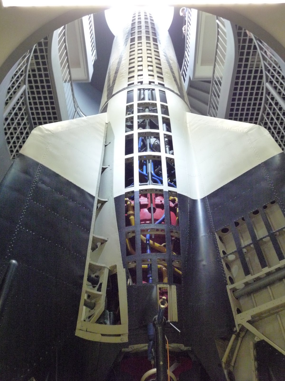 a big space shuttle hanging from the ceiling