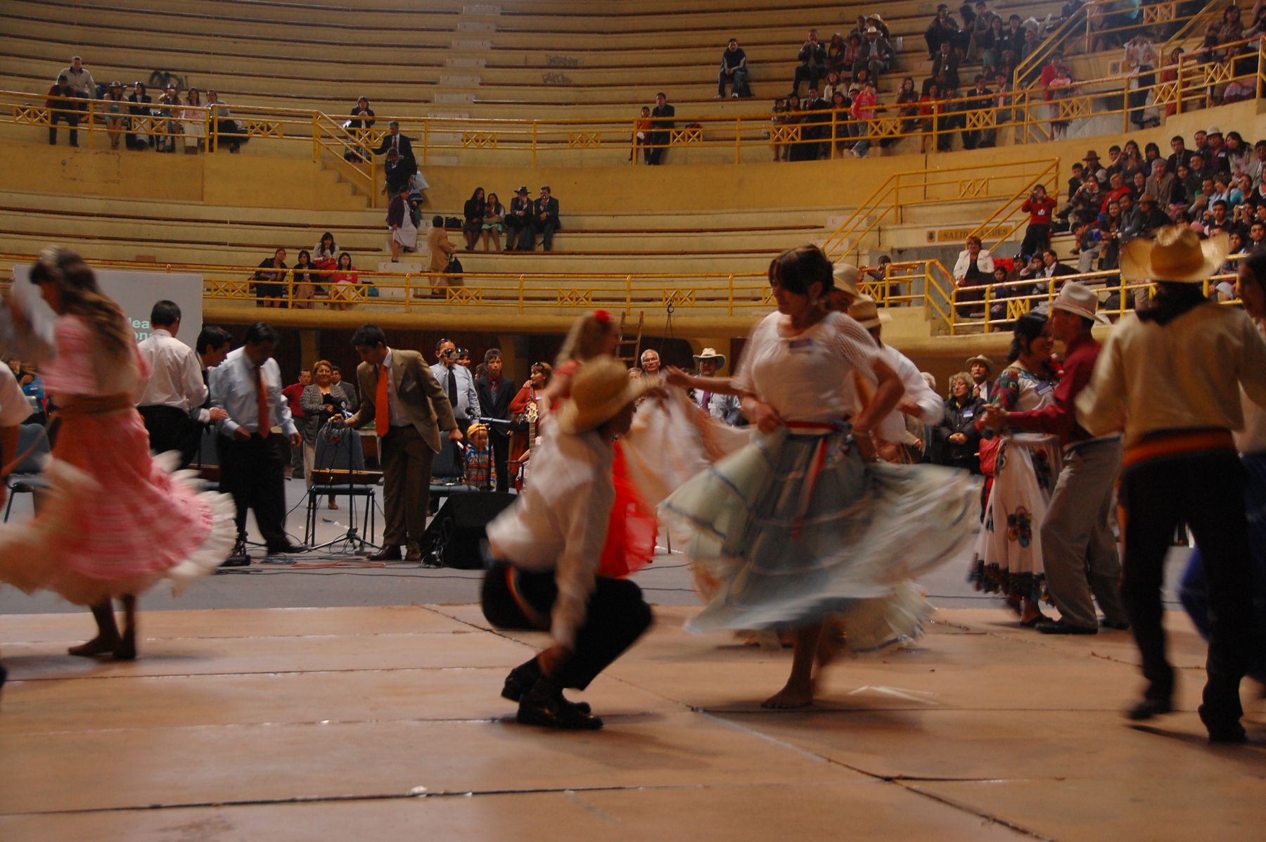 a group of people standing in front of a crowd