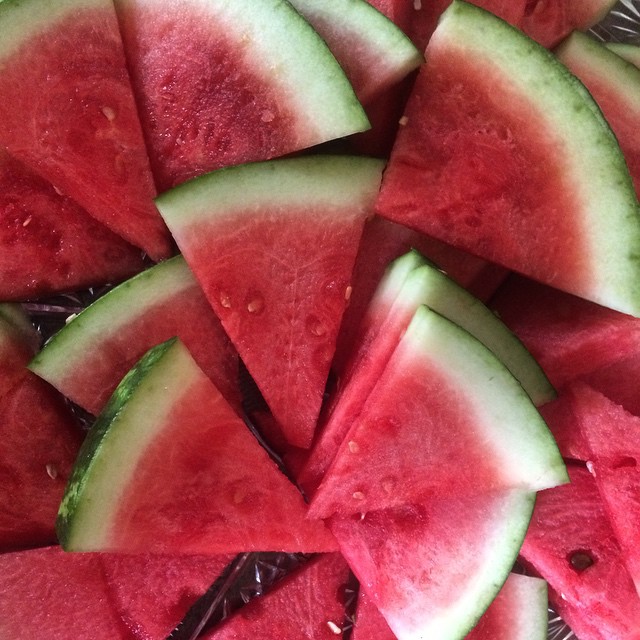a close up picture of several pieces of watermelon