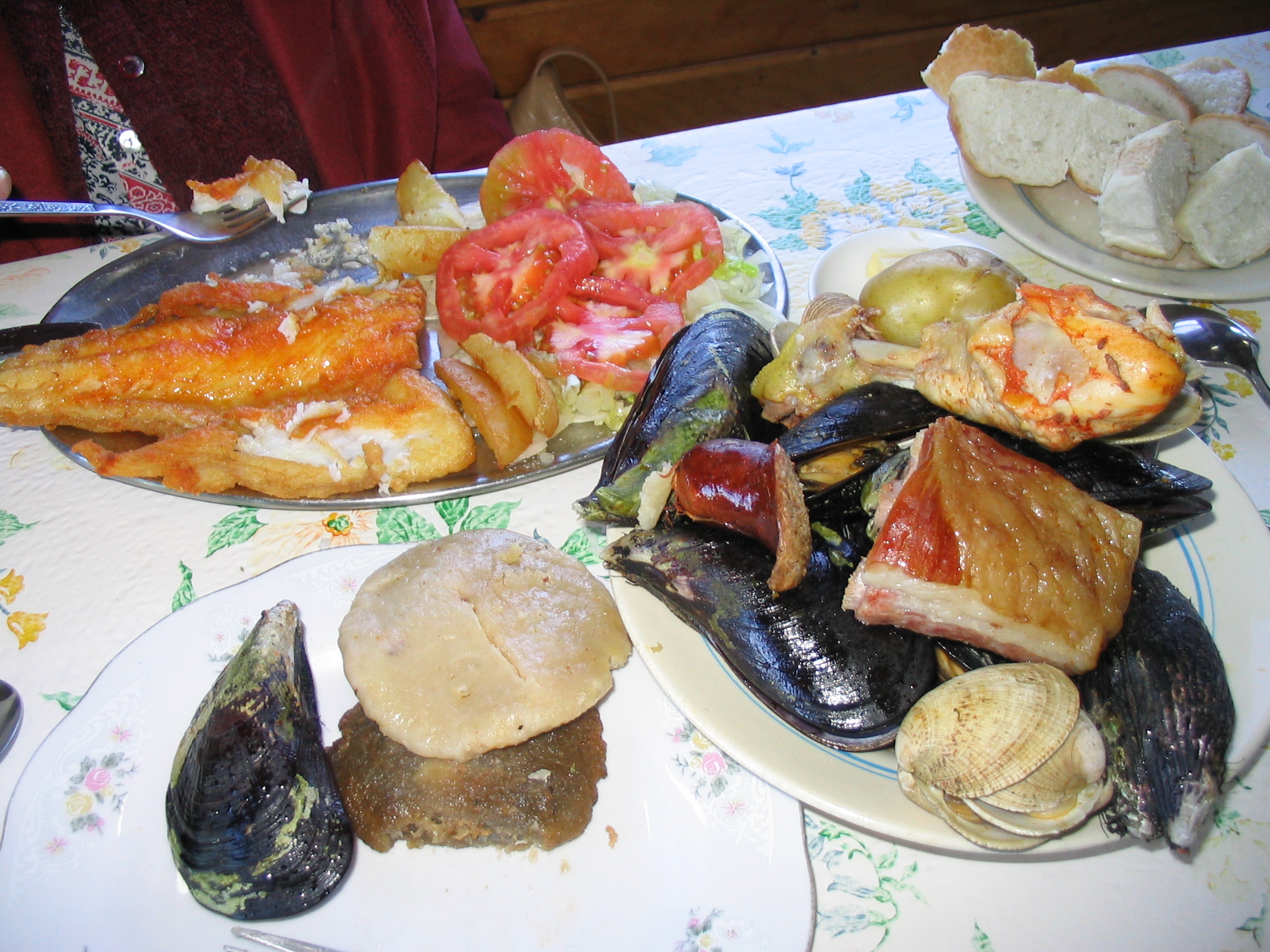 an assortment of food sitting on top of a table
