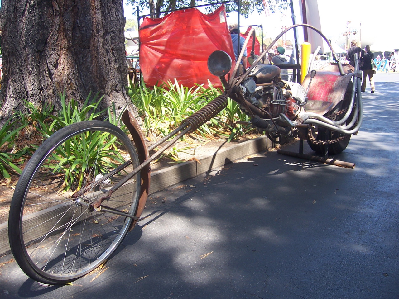 a bicycle parked against the side of the road
