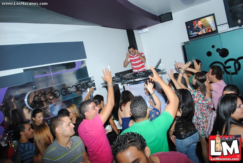 group of people playing instruments and dancing in a party