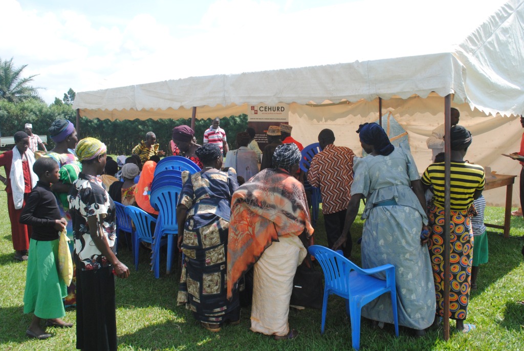 group of people at outdoor event with many in chairs