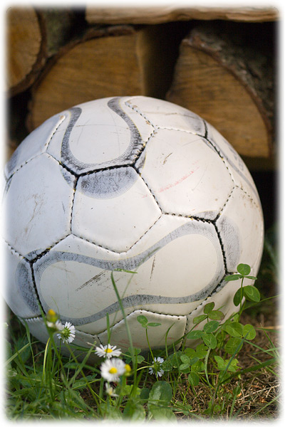 a soccer ball sitting on the ground