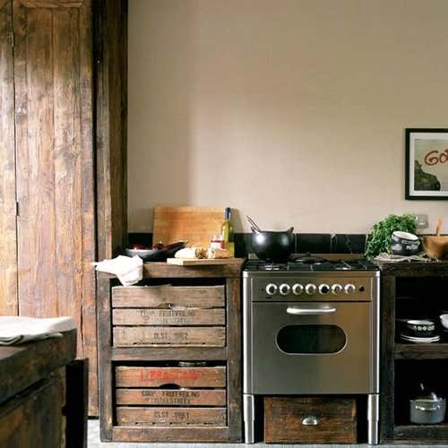 a kitchen with a stove and oven in it