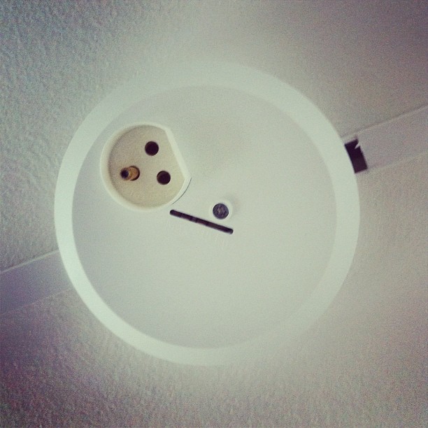 a small object is attached to the ceiling
