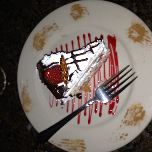 a partially eaten piece of cake sitting on a plate