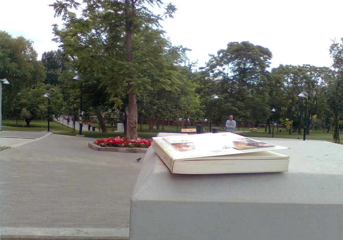 the book is on top of the monument