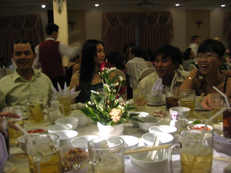 a group of people gathered at a table sharing a meal