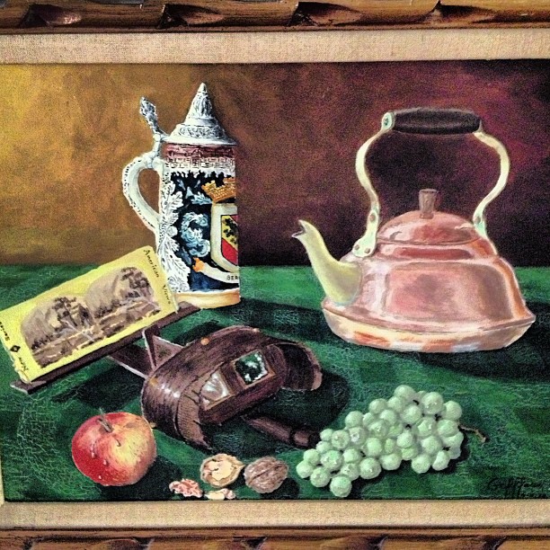 still life painting with coffee, teapot, apples, and a card