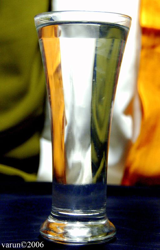 a close up of a s glass sitting on a table