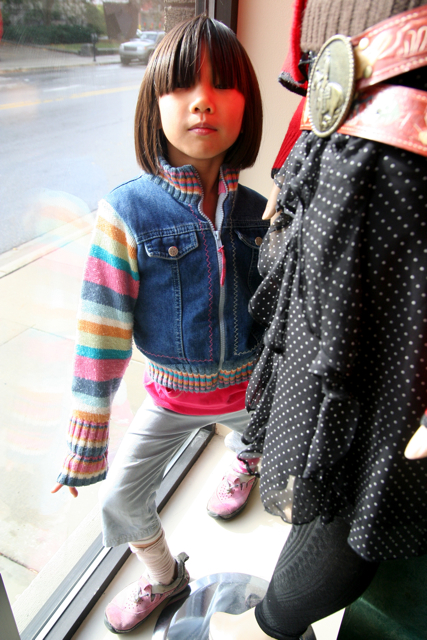 doll wearing an jean jacket, tight pants and shoes