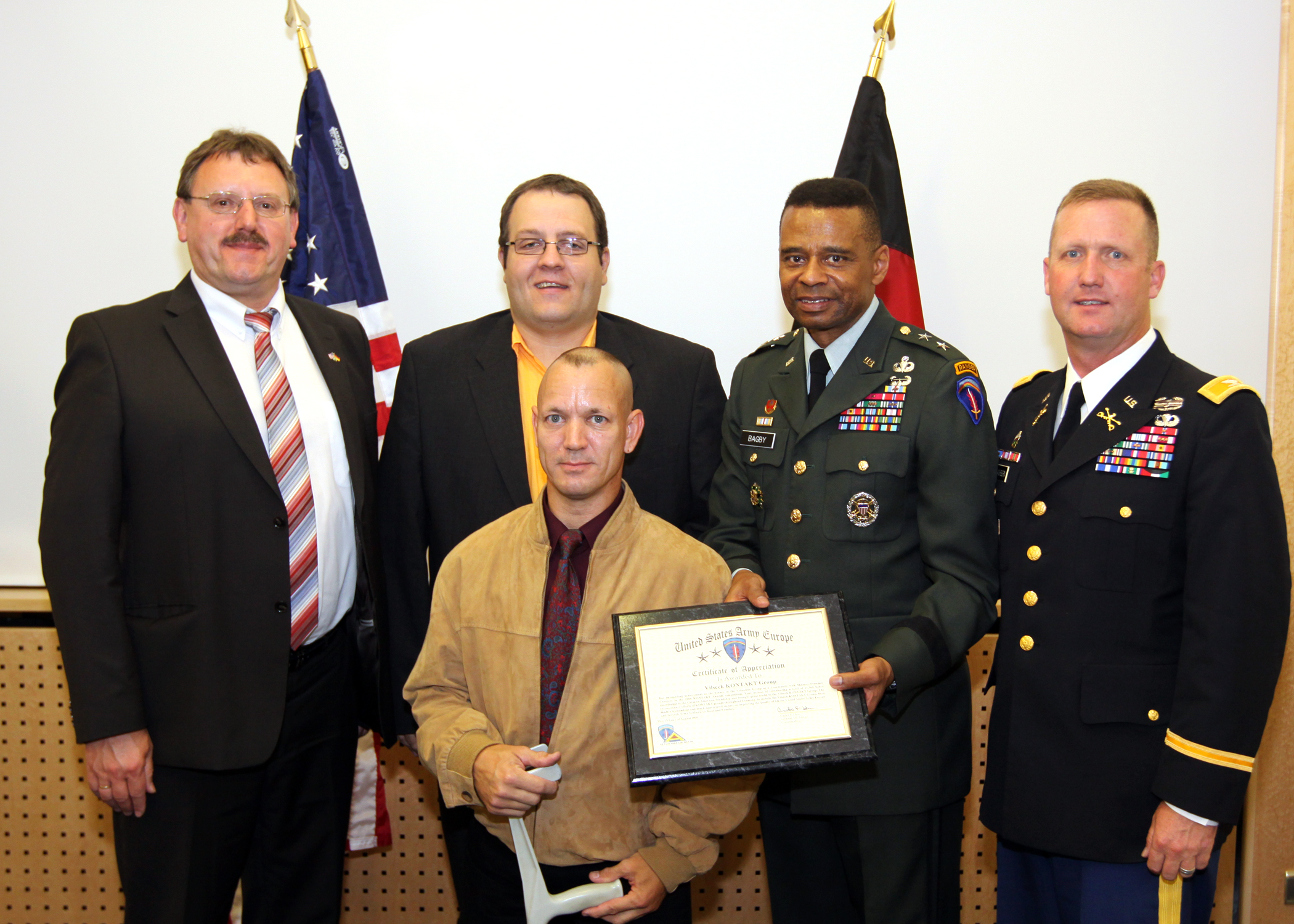 several people in military uniforms pose for a po