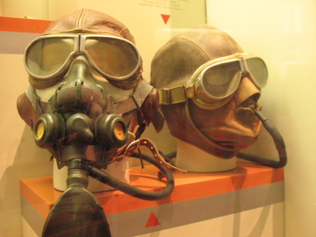three masks on display next to each other
