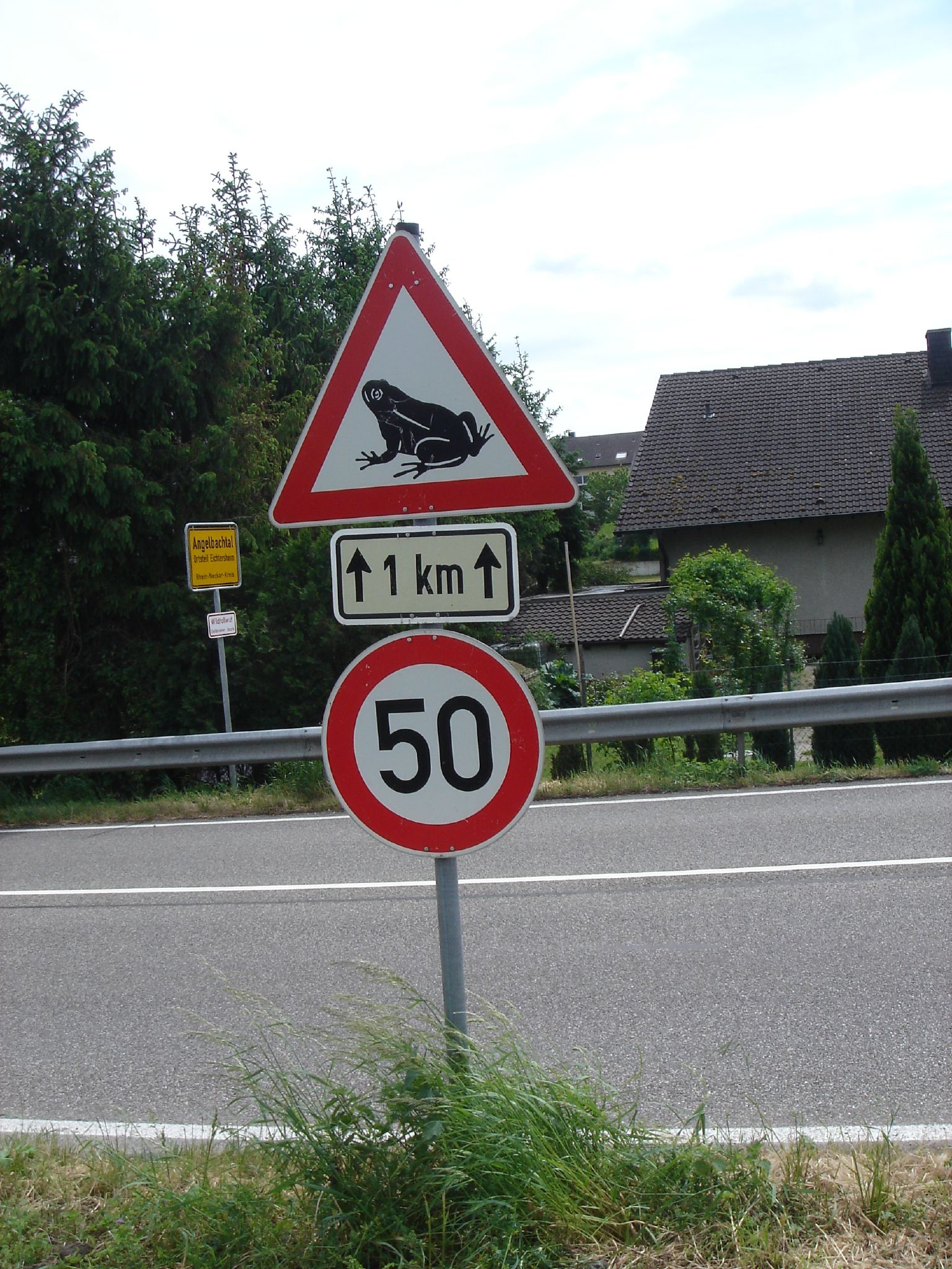a street sign that reads, speed limit ahead
