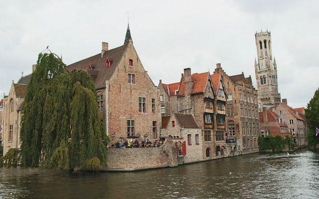 old buildings are lined up along the water side