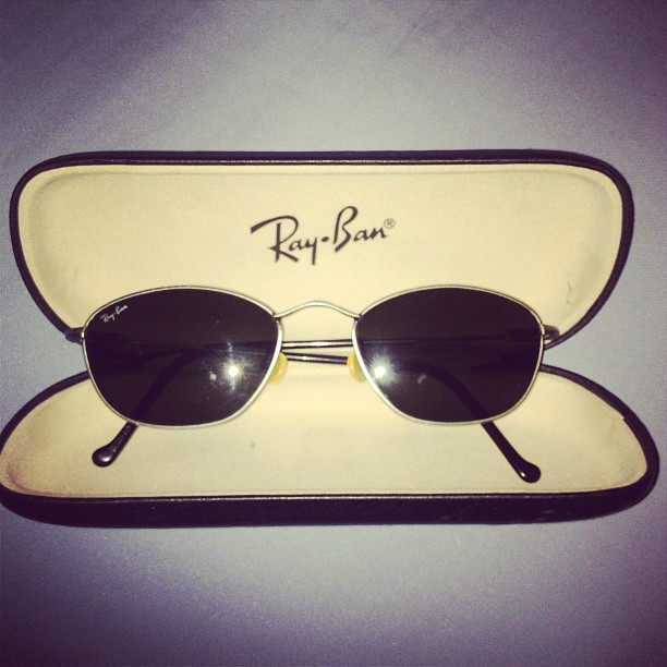 a pair of ray ban sunglasses with their box