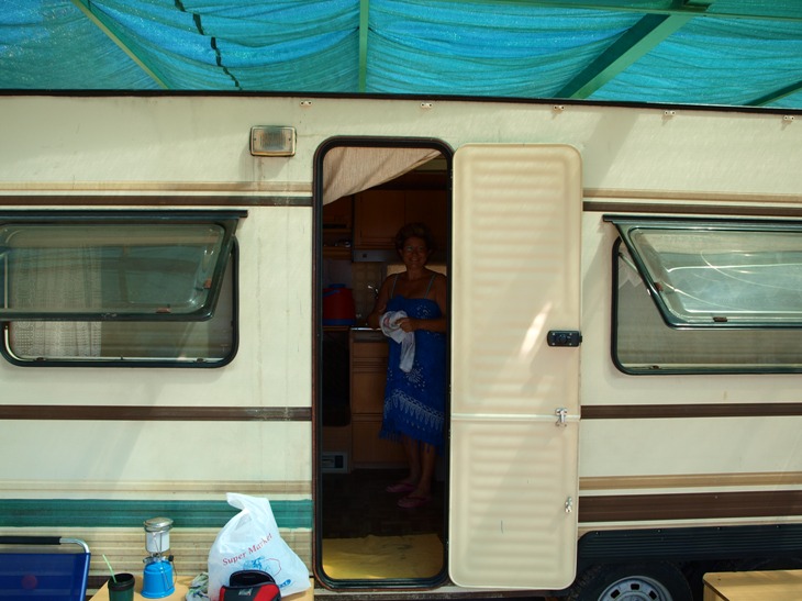 a camper with an open door on the inside
