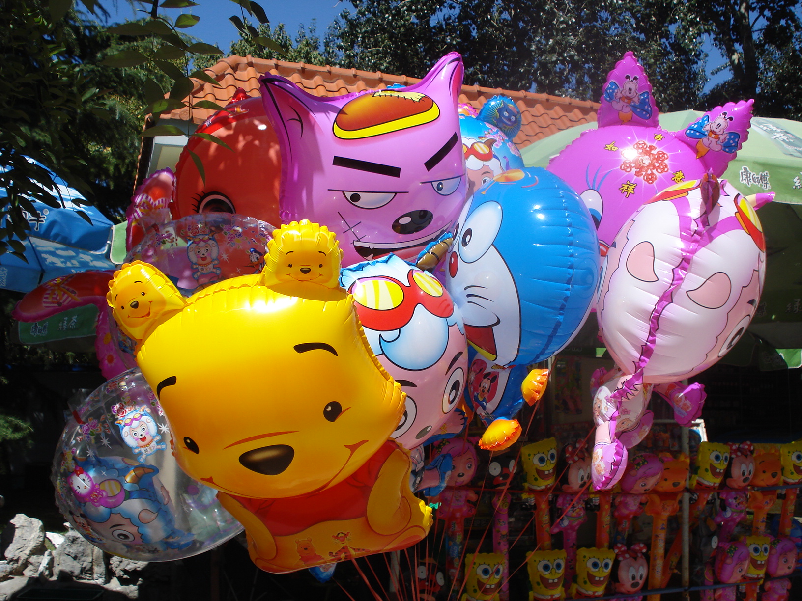 balloons shaped like winnie the pooh and friends