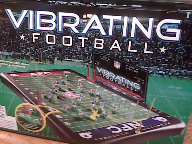 the box for an interactive football game is sitting on a table