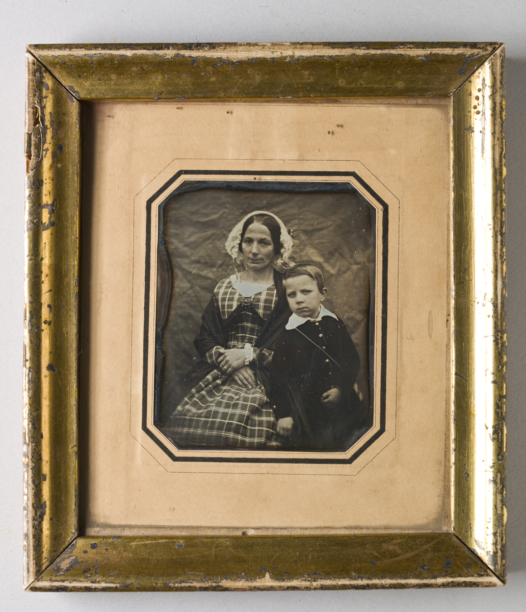 a small antique pograph of a couple