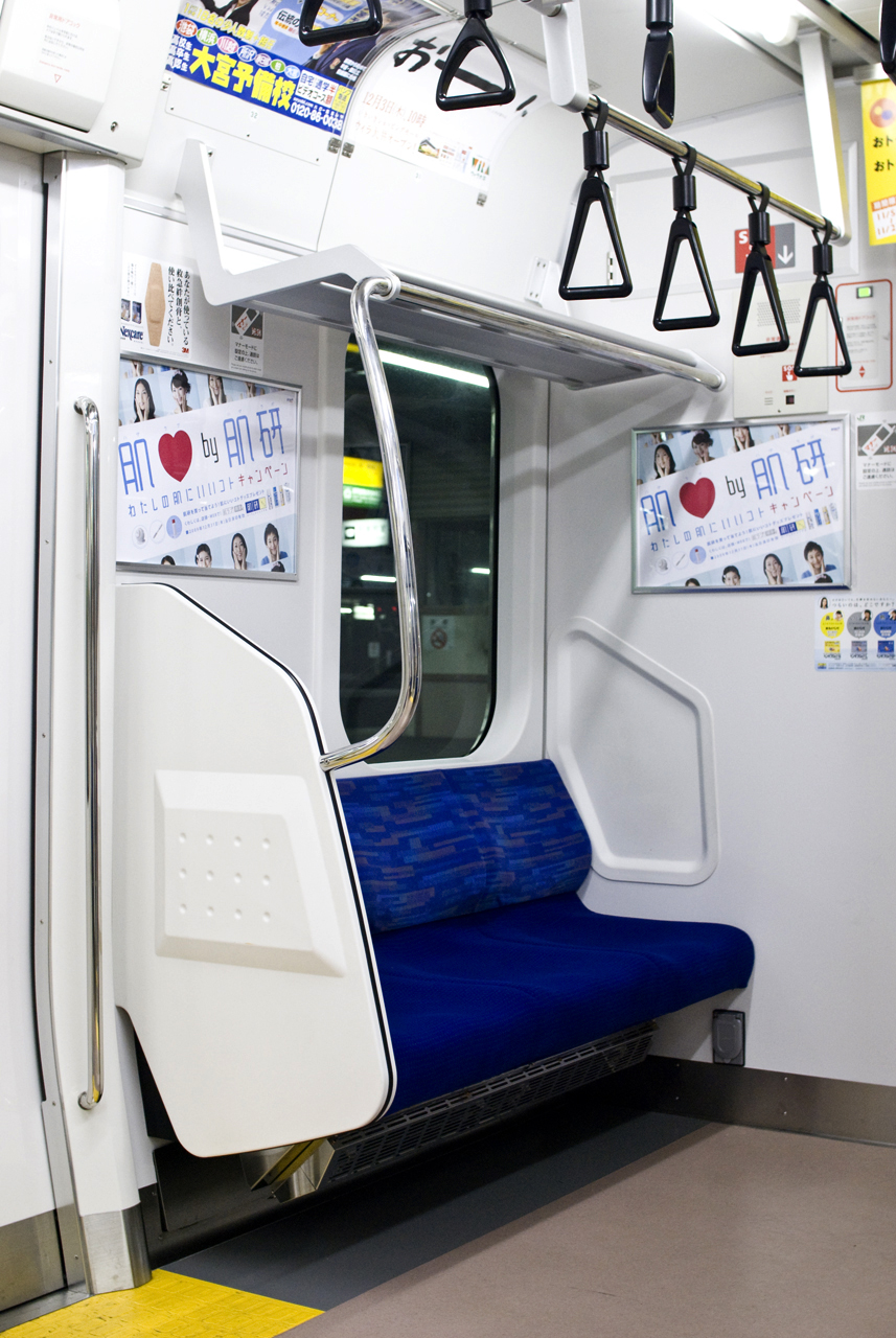 seats with no cushions sit on the back of a train