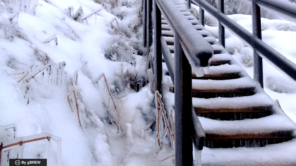 this is snow covered steps in a path