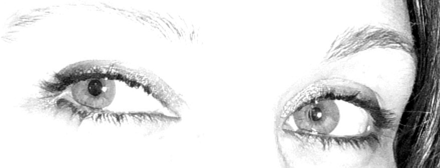 a close up of an open womans eye