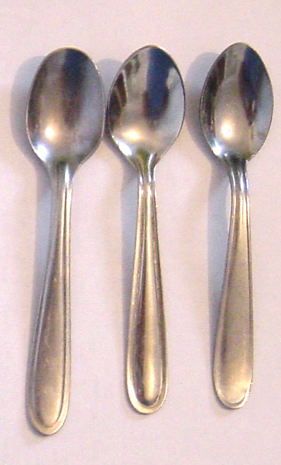 three spoons and one is silverware