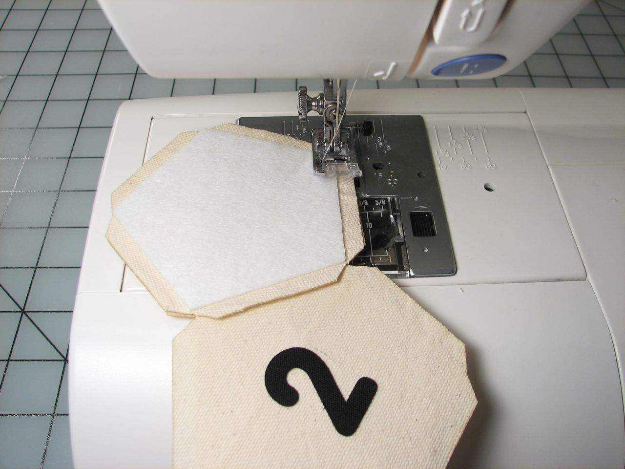 a picture of a sewing machine with fabric
