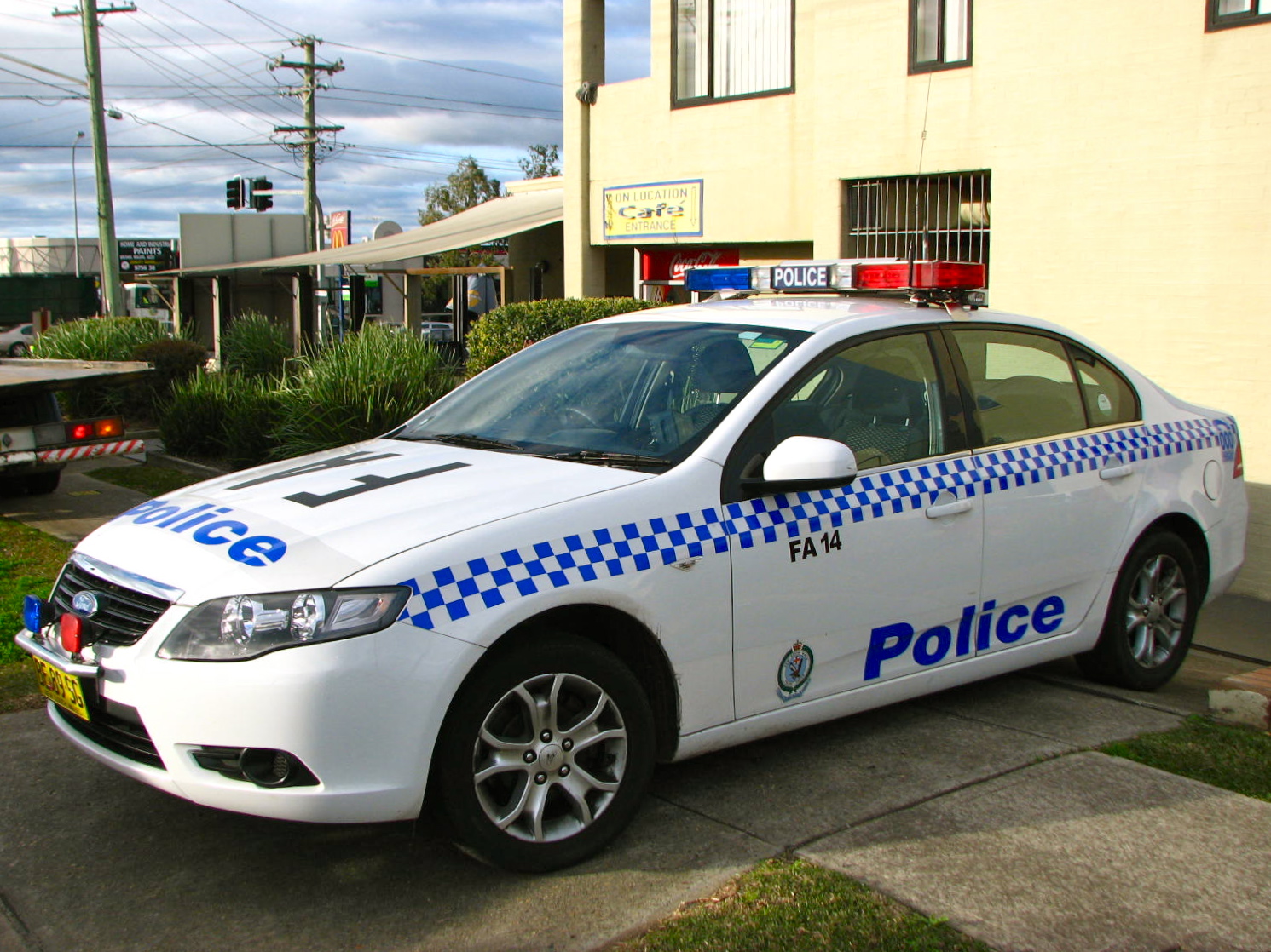 a police car that is parked outside of a building