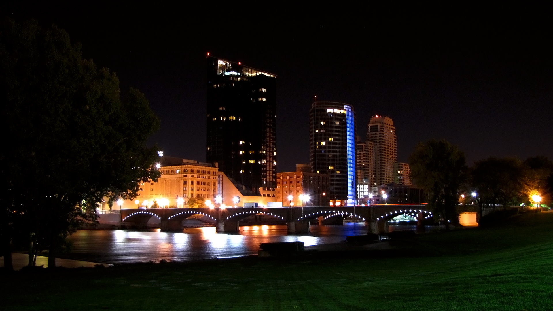 a city view of a bridge at night