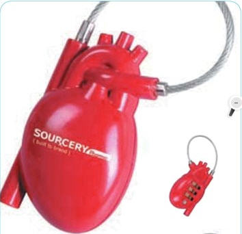 a red heart shaped device with key chain and keyring attached to it