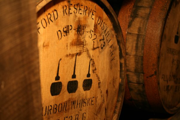 several barrels stacked up and ready to be used as liquor