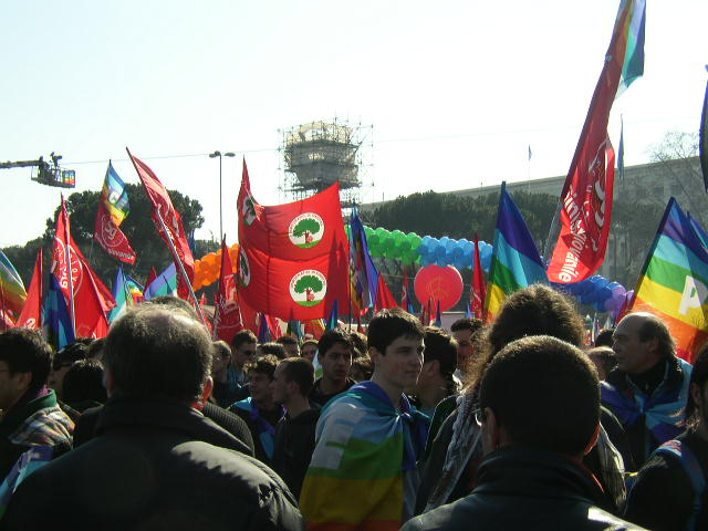 there are lots of flags being waved in a parade