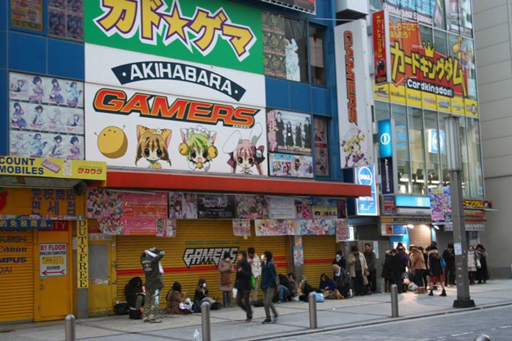 an asian movie and video store on a busy street