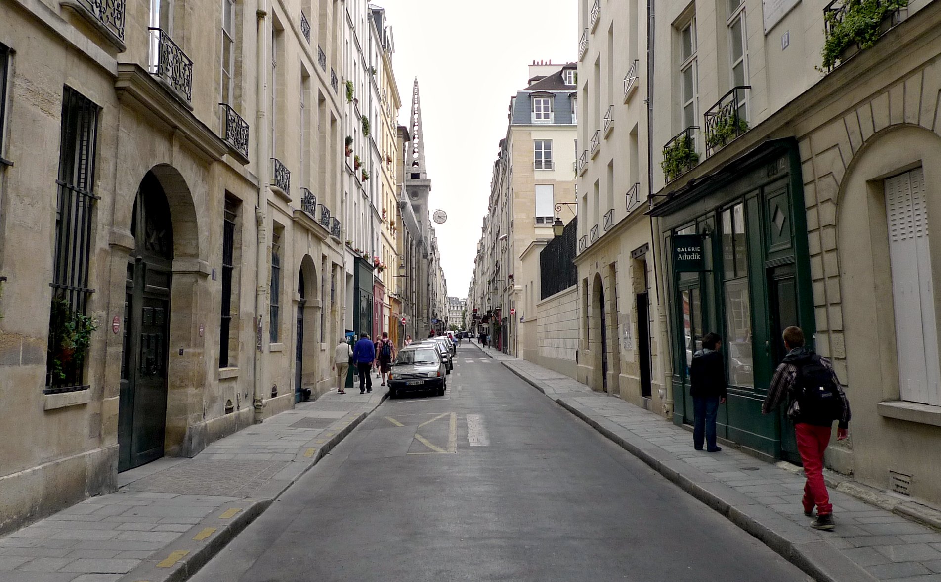 a street that has cars parked along it