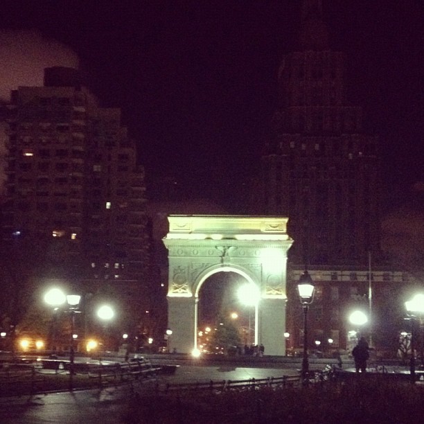 the big buildings are lit up at night