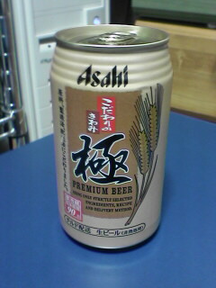 an asian canned beverage is sitting on a blue table