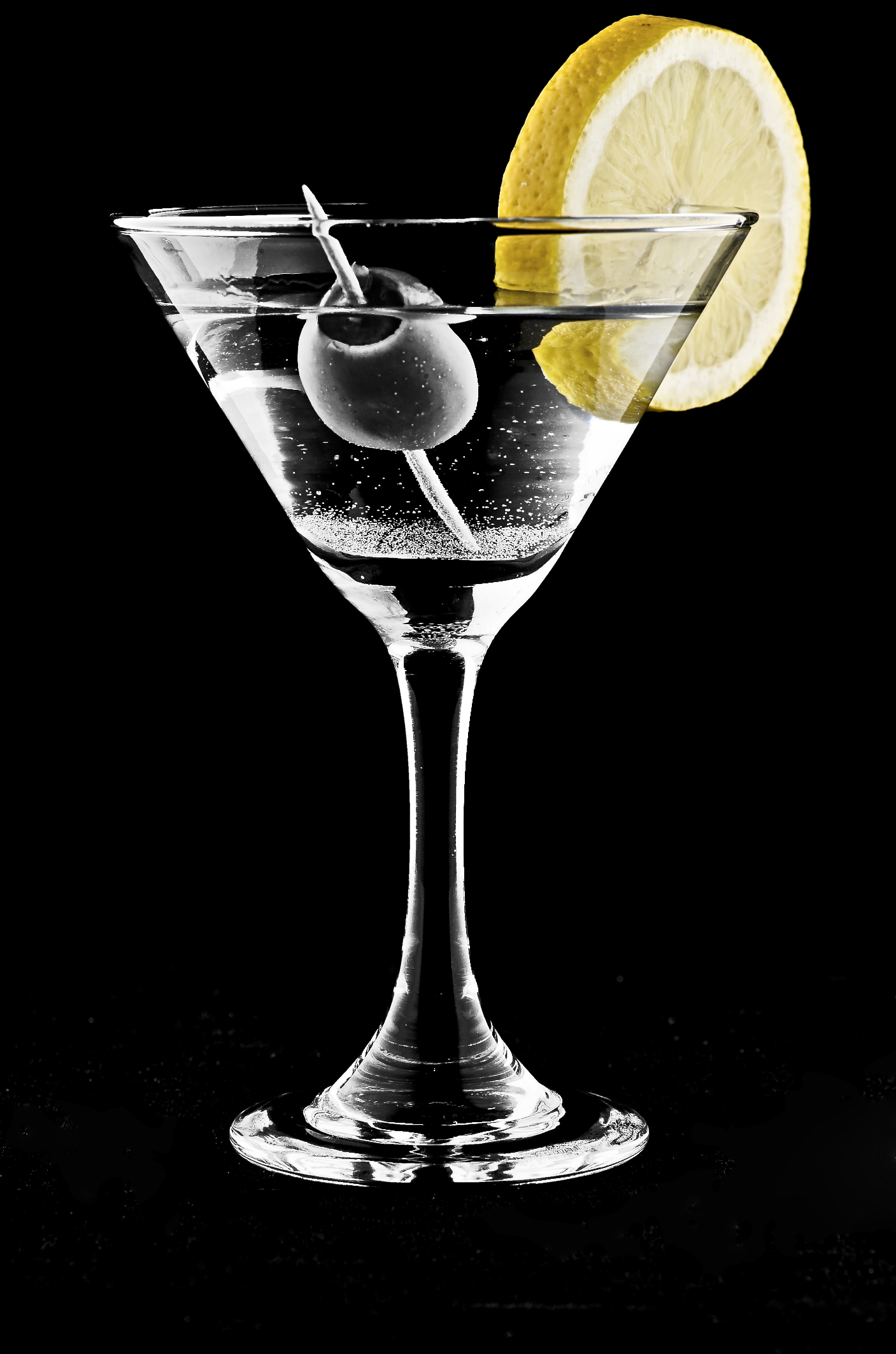 two martini glasses are sitting next to each other